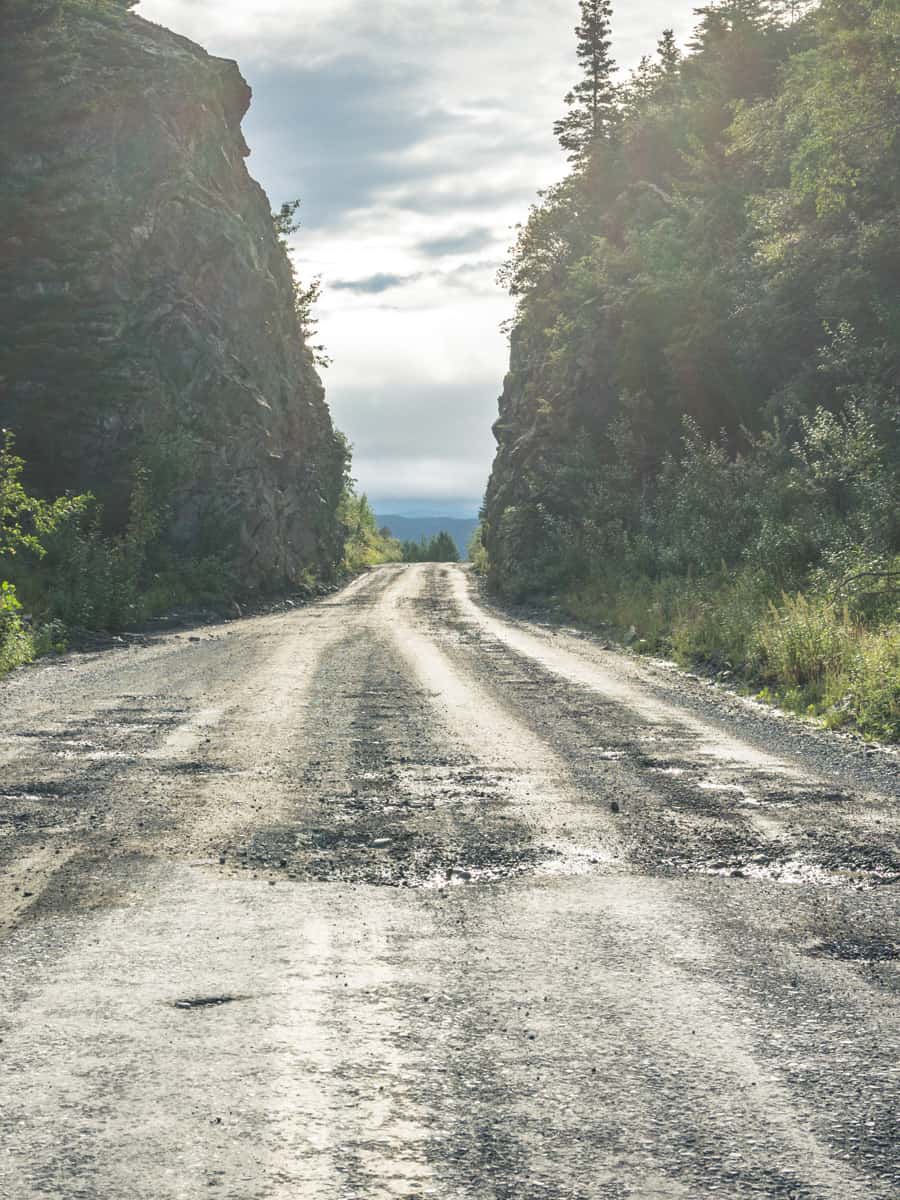 The McCarthy Road from Chitina to McCarthy in Wrangell-St. Elias National Park is dangerous, gravel road with potholes and railroad spikes that can flatten tires