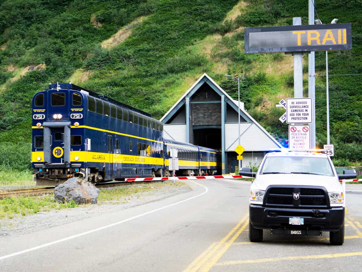 A train passes through the Whittier Tunnel as drivers wait for their turn to go into the longest combined vehicle-railroad tunnel in North America.