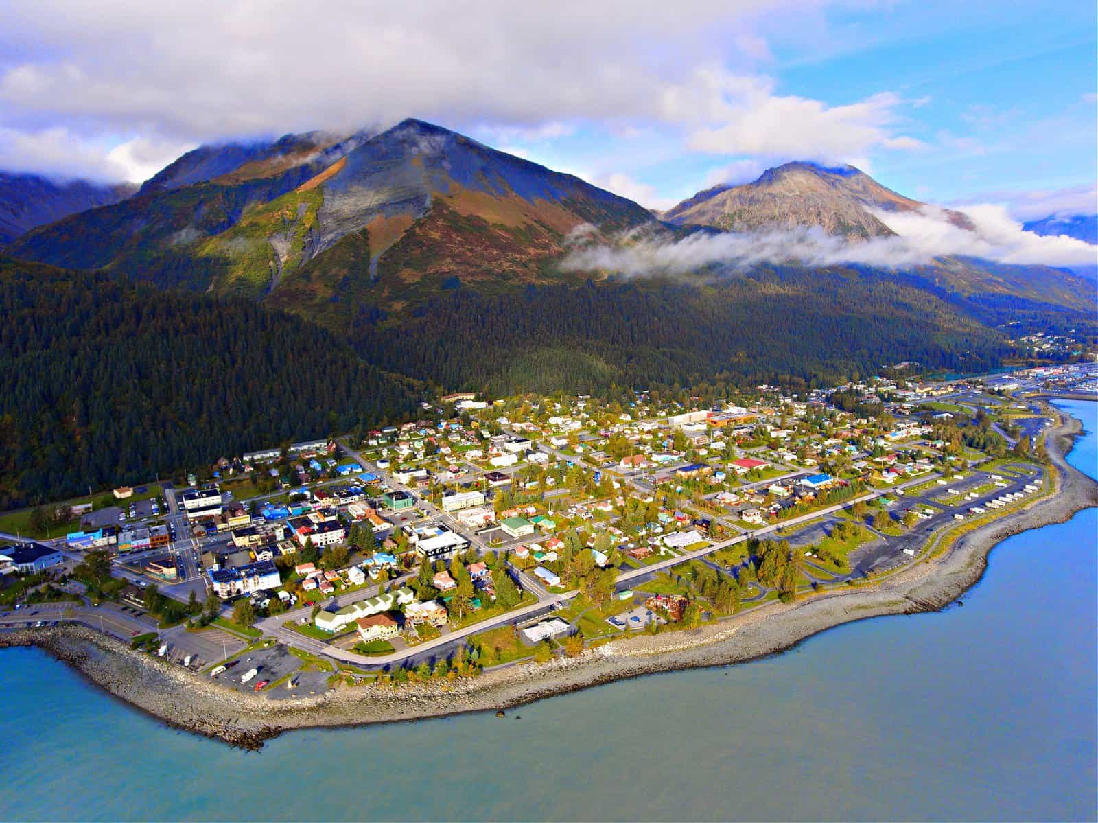 Aerial view of Seward city center and waterfront in fall, Seward, Kenai Peninsula, Alaska, USA. Seward is a city located on fjord Resurrection Bay at Gulf of Alaska on the Kenai Peninsula, near Kenai