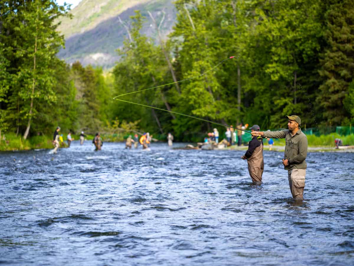 Fishermen fishing for salmon on famous 13-mile-long Russian River near Cooper Landing in Alaska