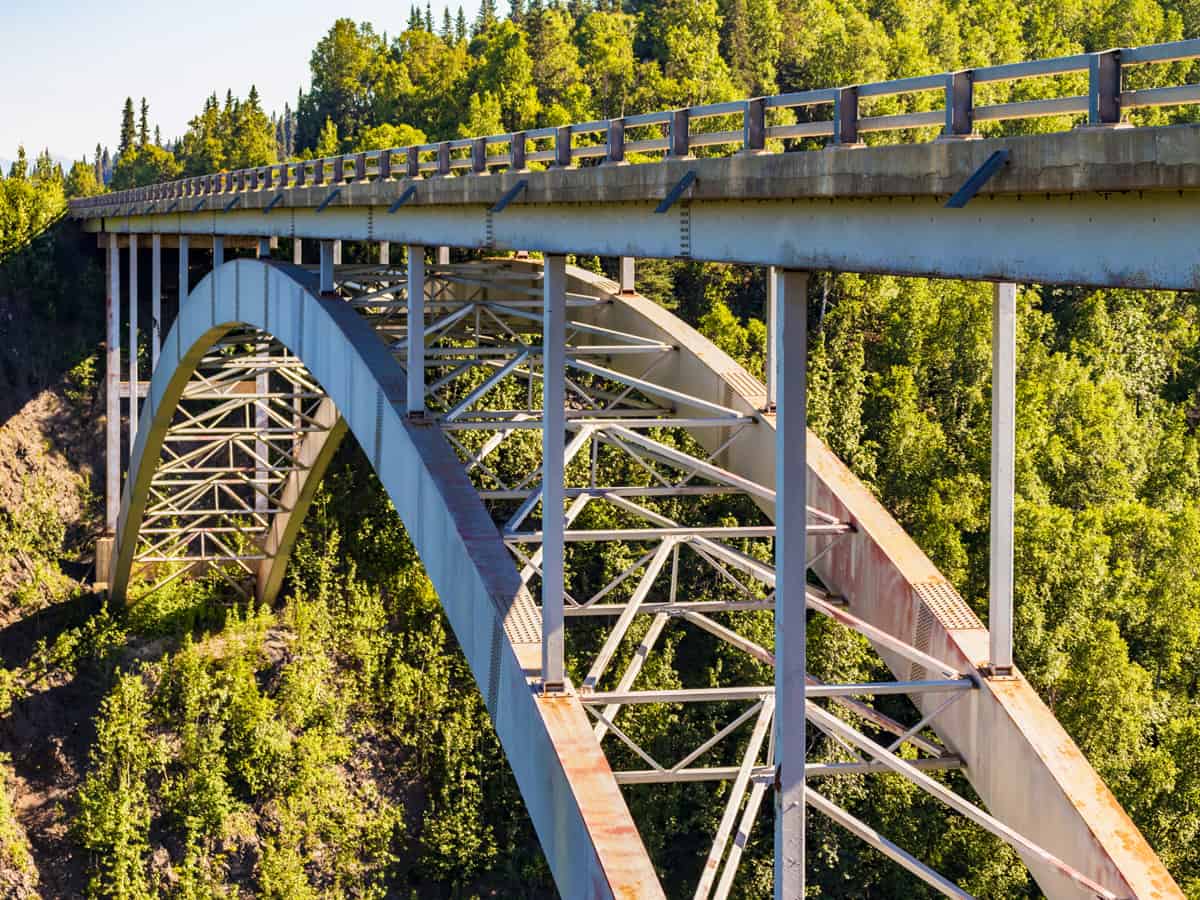 Hurricane Gulch Bridge, a steel arch bridge spanning Hurricane Creek on Parks Highway, Denali State Park, Alaska in summertime.