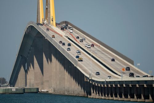 Sunshine Skyway Bridge over Tampa Bay in Florida with moving traffic.