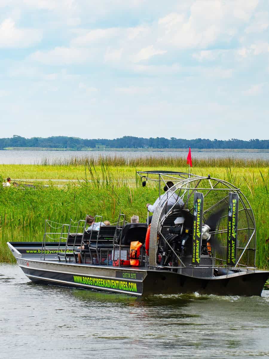 Tourists on an airboat ride in Boggy creek in the Florida everglades