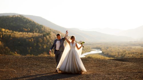 Wedding photo session of the bride and groom in the mountains 1600x900